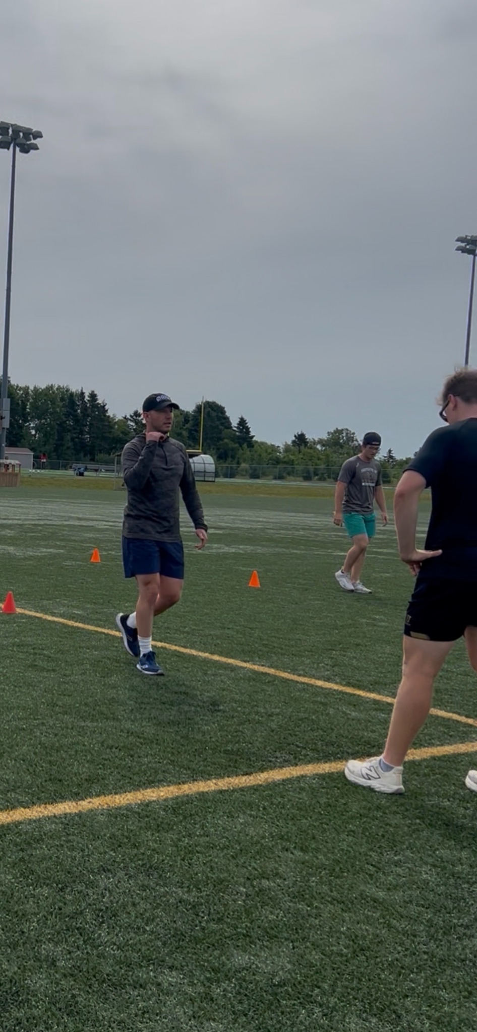 Athletes training on an outdoor field