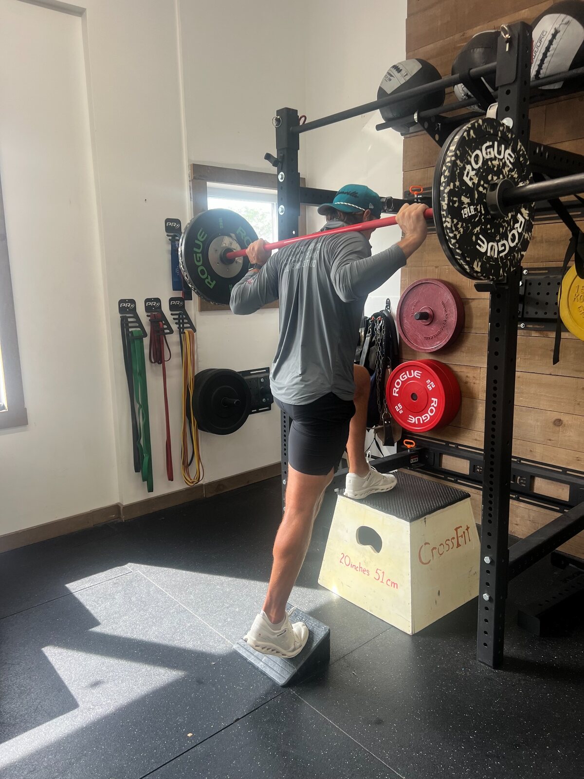 Athlete performing a strength exercise in the gym